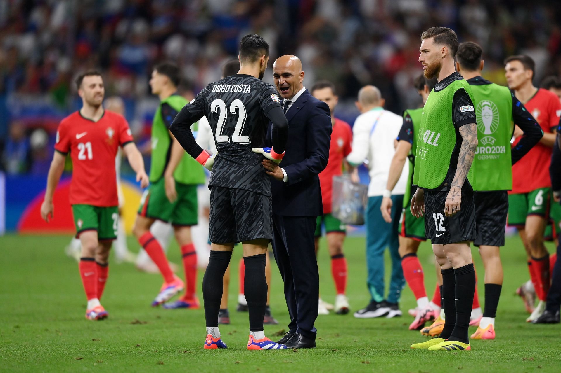 Diogo Costa (left) and Roberto Martinez